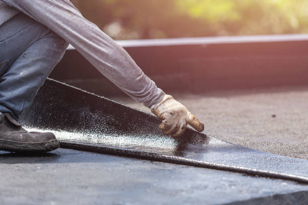 Professional Exterior Waterproofing technician working in Malta, IL